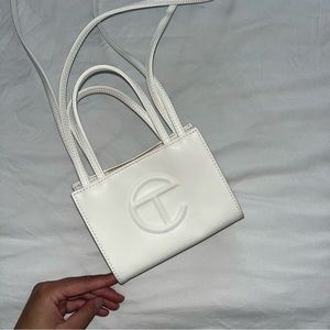 small white telfar shopping bag